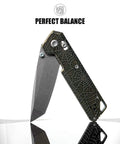 Ultra Thin EDC Knife With 2.9 Inch S35VN Blade And Titanium Handle, Precision Ground Tanto, Dope Build Facing Left Showing Blade