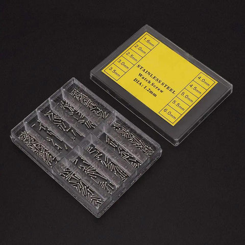 Pro Level Stainless Steel Crosshead Screws For Watch Case Back Repair With Several Precision Sizes Arranged Inside A Secure Labeled Storage Bin Silver Edition.