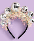 Disco Ball Headband For Parties And NYE Fits Adult And Kid Shiny Foil Crown For Birthday Bash Or Holiday Celebration Perfect Disco Bday Decor Hair Accessory with 5 metallic disco balls and iridescent tinsel on a flexible black headband.