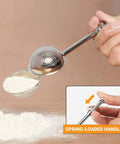 Flour Duster For Baking One Handed Operation Stainless Steel Powdered Sugar Shaker with spring-loaded handle in use