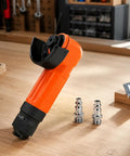 Workhorse Heavy Duty Handheld Angle Grinder Perfect For Wood Metal Cutting Rust Stripping And Quick Trim Work In Tight Corners With No Sweat Handling, orange handheld tool on wooden surface.