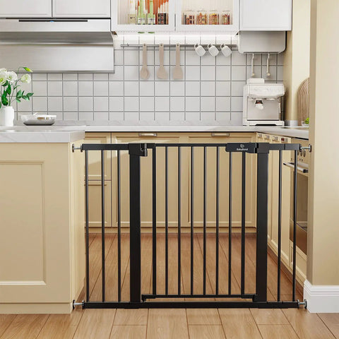Extra Wide Baby Gate For Stairs And Doorways Fits 27 To 43 Inches With Walk Through 21 Inch Opening 30 Inch Tall Auto Close Safety Gate For Dogs Includes Extenders And Hardware Mount Kit Black installed in kitchen doorway
