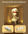 Rechargeable Indoor LED Spotlight Kit With Smart Auto Timer 5500mAh Battery highlighting artwork on a shelf