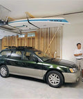 Overhead Garage Hoist System For Lightweight Cargo Carrier To Tuck Kayaks Canoes And Paddle Boards Up High Four Point Hoist 60 LB Max