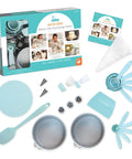 Playful Chef Kids Cake Decorating Kit With Pans Reusable Pastry Bags Stencils And Recipes shown with baking tools and materials