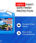 Heavy Duty One Gallon Windshield Washer Fluid With Tough Bug And Tar Blasting Blend For Darn Clean Streak Free Glass On Your Favorite Road Warrior Family Ride in a blue jug.