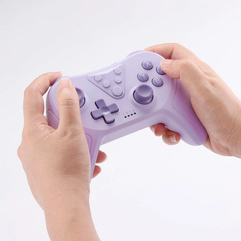 Holding a purple Wireless Bluetooth Gamepad For Switch With Wake Up Support 6 Axis Gyro Turbo Mode Adjustable Vibration Low Latency Pro Controller