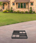 Plastic Path Maker Mold For Concrete Pavers 16.45 inch on driveway, ready for DIY landscaping projects, easy to use and durable.