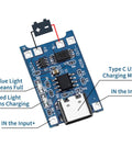 TP4056 Lithium Battery Charging Module And Protection Board With Type C Input 15 Pack positioned overhead with LED indicators and ports.