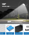 Lit Two Light Set 100W Solar Street Lights With Motion Sensor IP67 illuminating a suburban street at night with specs highlighted