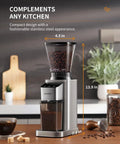 Conical Burr Coffee Grinder With 48 Grind Settings For Espresso, Drip And French Press, stainless steel, in a kitchen setting.