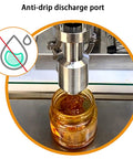 Rock Solid Automatic Liquid Filler Machine With Dripless Stainless Steel Nozzles Smart Touchscreen Control For Honey Oyster Sauce Jam And Butter Packaging, showing anti-drip nozzle above honey jar.