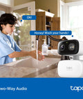 Indoor Outdoor Pan Tilt Wired Security Camera Two Pack For Baby Monitoring And Person Detection With Cry Alerts next to child at sink