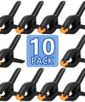 Front view of 10-pack 6-inch black plastic spring clamps with orange jaws for crafts and photography