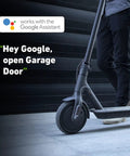 Smart Garage Door Opener Remote With App Control And Wireless Sensor That Plays Nice With Apple HomeKit Amazon Alexa Google Assistant And IFTTT Fits All Sectional Doors image with Google Assistant feature on scooter background.
