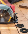 Outer And Inner Flange Washer Set For DSS610 DSS611 BSS610 BSS611 Blade Clamp Parts on a wooden table, saw in background