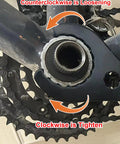 Close-up of a bike bottom bracket removal tool set in use, showing direction arrows for bicycle crank tightening and loosening.