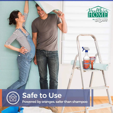 Couple using Dual Edge Premium Wallpaper Scraper Tool With Re Sharpenable Blade for easy sticky paste removal on wall