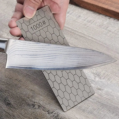 Using 11 Piece Diamond Sharpening Stone Set With Angle Guide And Leather Strop, Whetstone Honeycomb Surface With Non Slip Base, Ideal For Knives And Scissors, Pro Grade Sharpener Kit With 180 To 3000 Grit on a knife