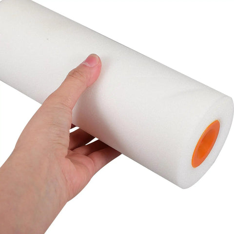 Master Your Next Painting Job With These Flexible Sponge Paint Roller Sleeves showing a hand holding a white foam roller for smooth painting.