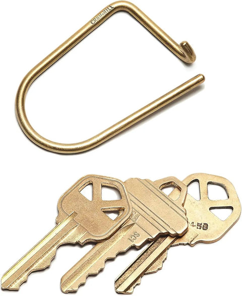 Wilson Brass Keyring With 2 Inch Carabiner Clip Minimalist Key Organizer holding several car keys on white background.