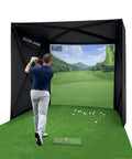 Man practicing in Home Golf Simulator Enclosure Complete Set With Heavy Duty Frame And HD Impact Screen And Pro Grade Putting Green Turf 8x8 Ft Tool Free Quick Setup In Under 5 Minutes Hitting Cage For Indoor Practice