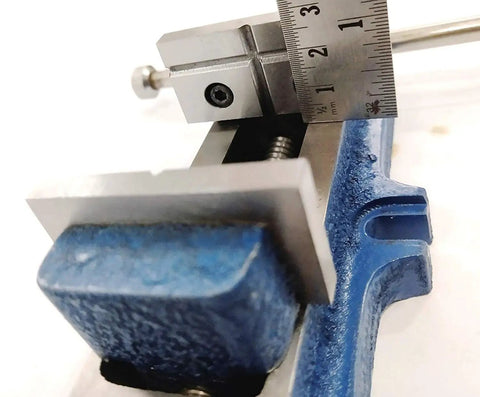 Close-up of Workhorse Self Centering Vise for Drilling and Milling Machines, fixed base, 50 mm jaw, showing measurement with ruler.