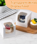 50 Pack Cupcake Containers With Windows, Food Grade Cupcake Boxes With Lids, stackable carrier displaying cupcakes on a table