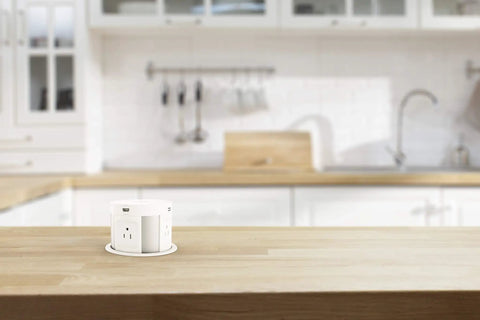 Slick Pop Up Countertop Outlet With Hidden Recessed Design, Wireless Charger Pad visible in a modern kitchen setting