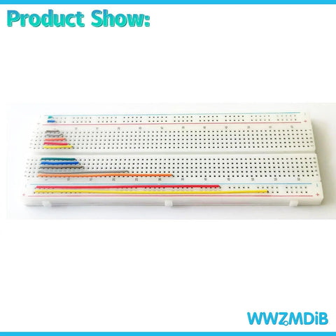 Breadboard Jumper Wires Kit With 840 Pcs, 14 Length Variants displayed on white breadboard