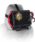 Rhino Rescue car IFAK trauma kit mounted on a black MOLLE pouch with red strap and tourniquet rings (front view)