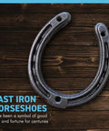 Authentic Handmade Cast Iron Horseshoe Wall Decor Heavy Duty Good Luck Charm Wedding Present Includes Hardware on wooden background.