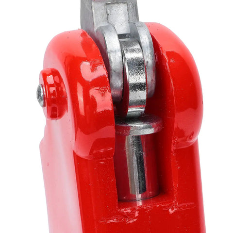 Close-up of Premium Metal Badge Machine Button Maker showing red ergonomic handle and metal mechanisms for DIY gifts and crafts.
