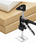 Heavy Duty Hand Lifting Tool Jack 2 Piece Set Multi Function Tile Installer For Precise Wall Placement Rock Solid Metal Build tool gripping tile on wood surface