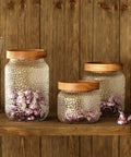 Premium Glass Coffee Canister With Secure Locking Lid Wide Mouth Kitchen Storage Jar For Beans Sugar Loose Tea Clear Airtight Food Container on shelf.