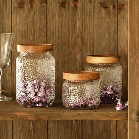 Premium Glass Coffee Canister With Secure Locking Lid Wide Mouth Kitchen Storage Jar For Beans Sugar Loose Tea Clear Airtight Food Container on shelf.