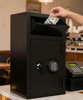 Heavy Duty Front Drop Safe Box Built To Last Fireproof Waterproof For Home And Office With Top Lock Cash Stash Compartment Anti Fishing Security Free Fireproof Bag For Cash Jewelry And Important Documents being used in a store.