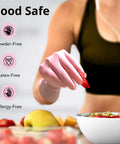Top Shelf Disposable Nitrile Dish Gloves With Extended 12 Inch Cuff, 6 Mil Thick Guard, Cherry Blossom Print, Latex Free, Straight Up Reliable For Deep Cleaning And Hair Dye, Box Of 100, worn by a person picking strawberries.