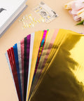 Hot Foil Paper Dope 20x29cm 50 Sheets Mixed 16 Colors Toner Reactive displayed with decorative items