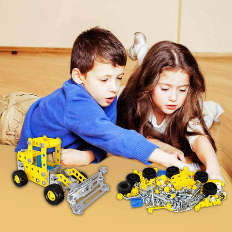 Two children playing with 7 In 1 STEM Vehicle Kit For Kids Ages 8 9 10 11 12 Plus 180 Piece Construction Set For Building Forklift Dump Truck Crane Bulldozer And More Hands On Engineering Fun