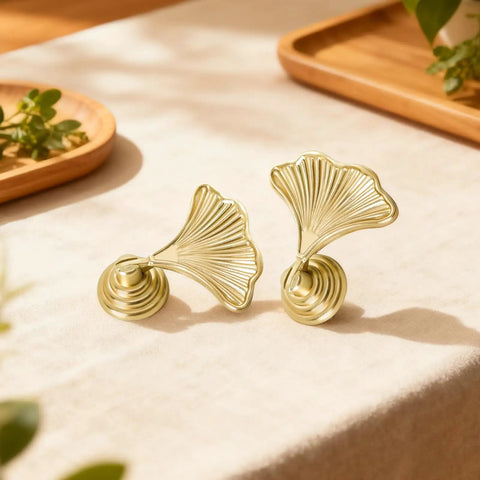 4 Piece Dope Golden Leaf Knob Set For Cabinets And Drawers, Metal Door Handles displayed on table, premium finish