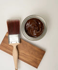 No Sweat Oil Base Gel Stain In Chestnut with a brush on a wooden surface, showing rich texture for DIY projects.
