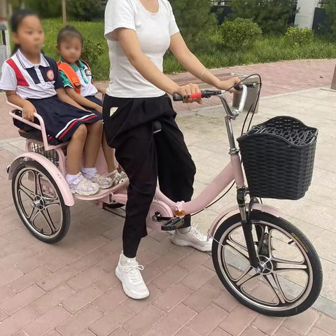 Hassle Free Fold Tandem Tricycle For Adults And Seniors With Rear Bucket Seat And Locking Safety Strap 20 Inch Front Wheel Heavy Duty Steel Frame Bright Pink Chill City Cruisers with two children riding.