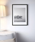 Black and white framed photo on wall with couch and lamp, demonstrating Peel And Stick Molding And Wall Trim Set For DIY Home Decor On Cabinets Doors Mirrors And Frames Self Adhesive No Mess Easy Install Non Toxic 16.4 Ft Long By 0.8 In Wide.