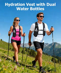 Two hikers wearing lightweight running vest with dual 500ml soft flasks for hydration, unisex pack for marathon training.