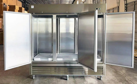 Professional Grade Commercial Stainless Steel Reach In Freezer With Three Roomy Solid Doors opened, showcasing spacious interior for storage.