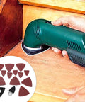 Heavy Duty Oscillating Tool Sanding Kit With Triangular Finger Pads And 100 Sandpaper Sheets in use on wood surface.