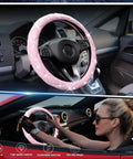Cute As Heck Pink Steering Wheel Cover With Diamond Bling And Smooth Leather Grip fits 15 inch wheel, shown in car interior.