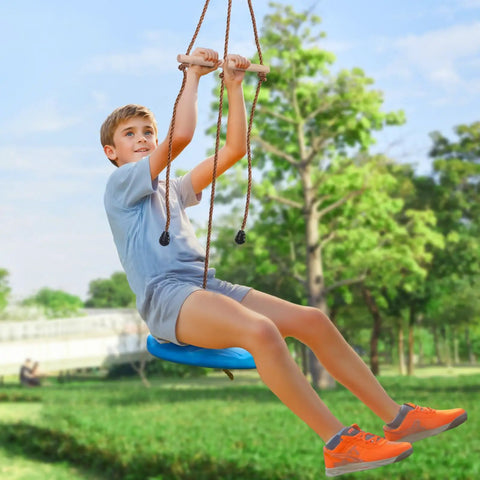 Child using 52 Ft Backyard Zipline Kit For Kids And Adults Up To 330 Lb With Quick Setup Swing Seat Handlebar Nylon Safety Harness outdoors