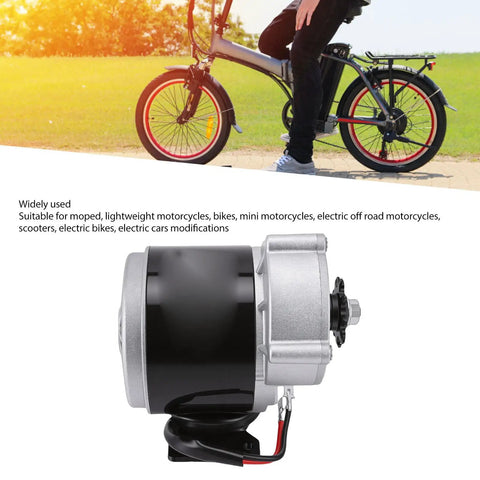 Beefed Up Gear Reduction Electric Motor Kit 12V 500W With Speed Knob Controller and Bike in Background